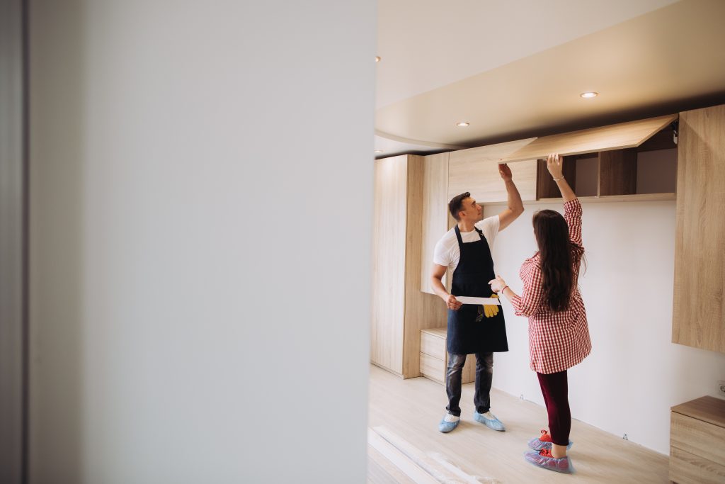 kitchen remodeling with an expert and woman 